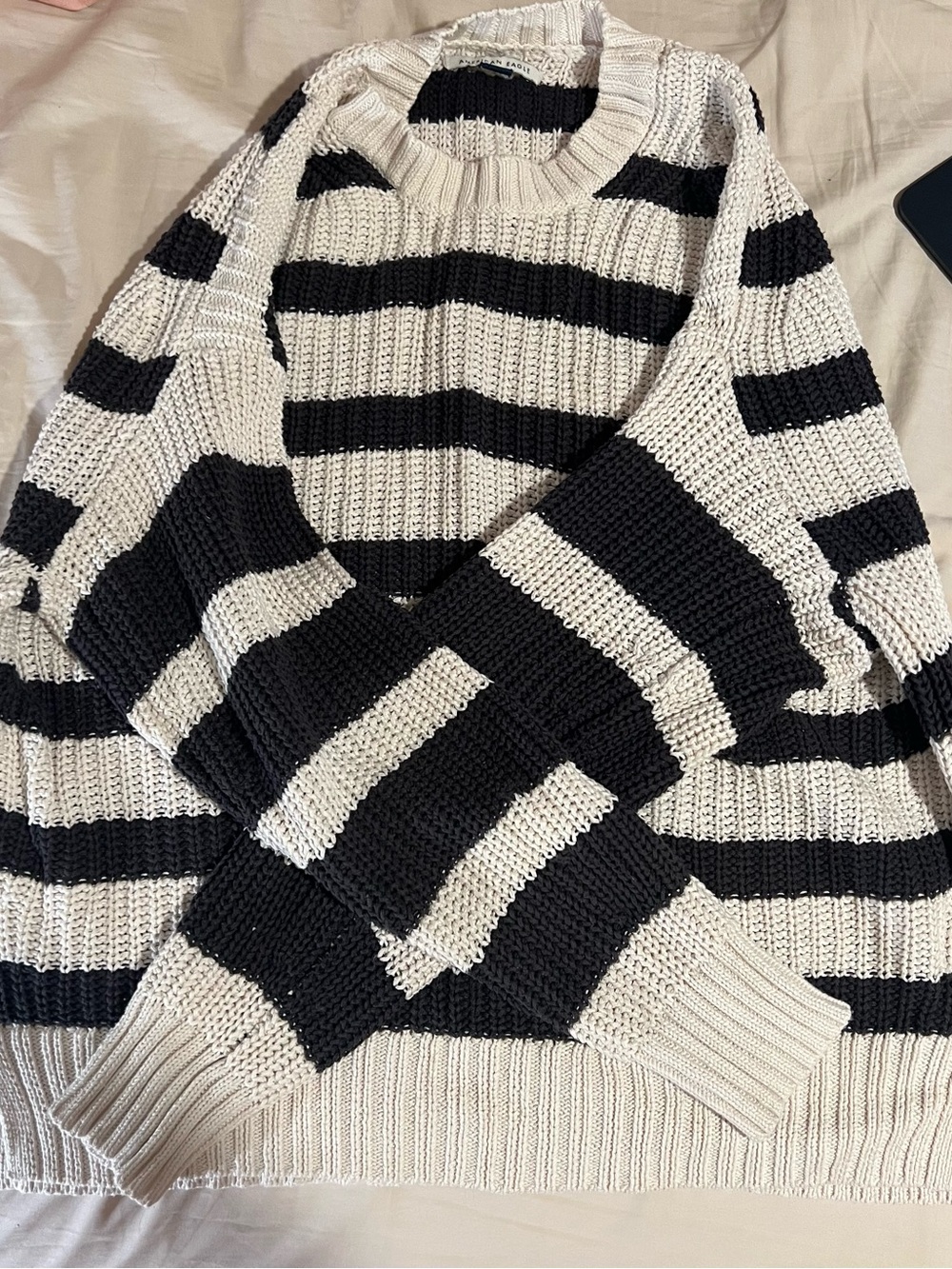American Eagle black and cream striped sweater